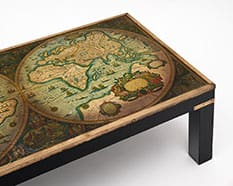 Vintage French 17th Century World Map Coffee Table With Brass Trim and Ebonized Wood. Circa 1960. Original World Map Published By Scolari. You Can Find This Rare Coffee Table At Jean-Marc Fray Antiques in Austin, Texas. Ask Us About Shipping. 