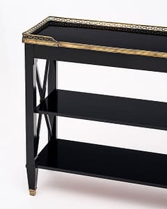 French console table made of Mahogany wood, ebonized and finished with a lustrous museum quality French polish. Gilt brass trims and feet.