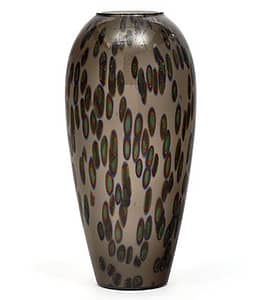 Vintage Murano glass “murrine” vase made by artisans in Italy. This hand-blown piece of art features the “murrine” technique - colorful images made in glass cane that are revealed when the cane is cut into cross sections. The vase is then finished with a gray “incamiciato” layer.