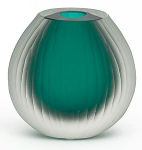 Set of three Murano glass vases in the manner of Tobia Scarpa. The set has been made using the “battuto” or hammered technique. They are in a beautiful emerald tone. The measurements listed are for the tallest vase. The measurements for all three are listed below.