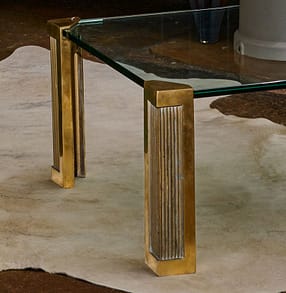 how to mix various styles in your space - bronze coffee table