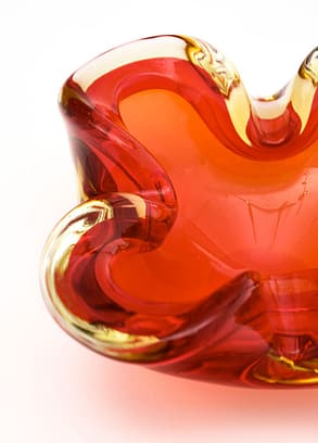 Bowl made of hand-blown Murano glass in crimson red and gold tones. Add a small murano glass red bowl to your home.