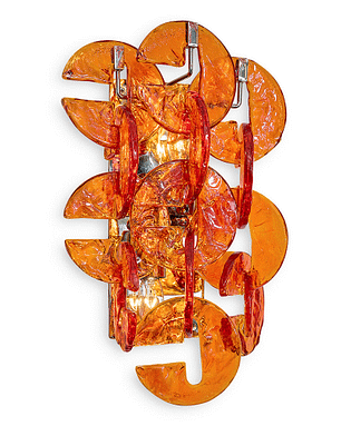 Pair of Murano glass sconces from the island of Murano, Italy. The sconces feature multiple C shaped orange hand-molded glass components in the “ferro Battuto” fashion. They sit on a chromed steel structure. This pair has been newly wired to fit US standards. Add some color into your space with these amazing and iconic ganci sconces.