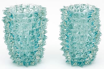 Pair of Italian Murano glass vases; in Aqua color; crafted in the “rostrate” technique ; in the manner of iconic Murano glass powerhouse “ Barovier “; mimicking birds beaks. We love the striking Aqua color and texture of the “rostrate” technique.