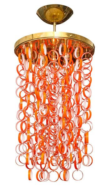 Vintage Italian Murano Glass Vistosi Chandelier. Featuring multiple strands of white and murano tangerine hanging from a solid brass structure. Circa 1980 from the iconic Vistosi studio in Italy. 