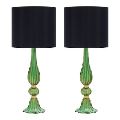 Pair of lamps from the island of Murano with ridged green glass blown and fused with 24 carat gold flecks in the “avventurina” technique. It is accented with gilt brass rings. They have been newly wired to fit US standards. Adding a colorful table lamp to your space is a great way to elevate your home.