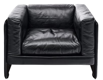 Leather armchair of black leather by Poltrona Frau. Poltrona Frau continues to produce high quality leather products.