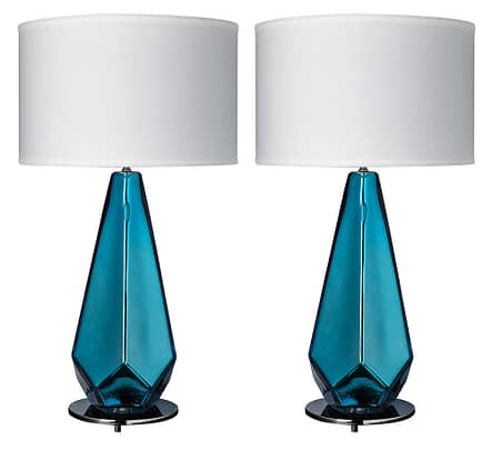 An important pair of blue “specchiate” Murano glass lamps. This mirrored pair has a striking metallic color and impressive shape. They have been newly wired to fit US standards and sit on a chrome finished base. The perfect blue for your kitchen table nook or counter.