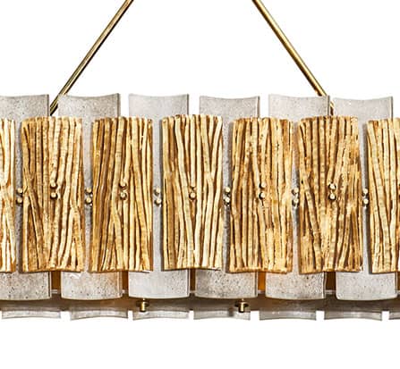 Murano glass scavo chandelier. Each leaf of the chandelier is used with the scavo technique; which leaves the pieces with a corroded or etched finish. Each side of the chandelier shows 11 plates attached with solid brass nuts. This piece also features stylized bark glass with a gold leafed and patinated finish. It has been newly wired to fit US standards. Perfect linear modern chandelier for your kitchen island. 