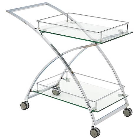 Bar cart, French, of chromed steel. The modernist bar cart features two thick glass shelves and is supported on casters. Use this cart in unexpected ways like using it as a bathroom organizer.
