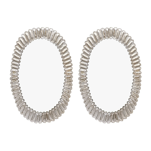 Murano glass silver leaf mirrors by Fuga. This Italian pair has silver leaf fused in the hand-blown glass elements. Each oval component is fused together to form a crown, enhancing the decorative impact of these beautiful, organic mirrors. We love the oval shape and textured glass! Can be sold separately.