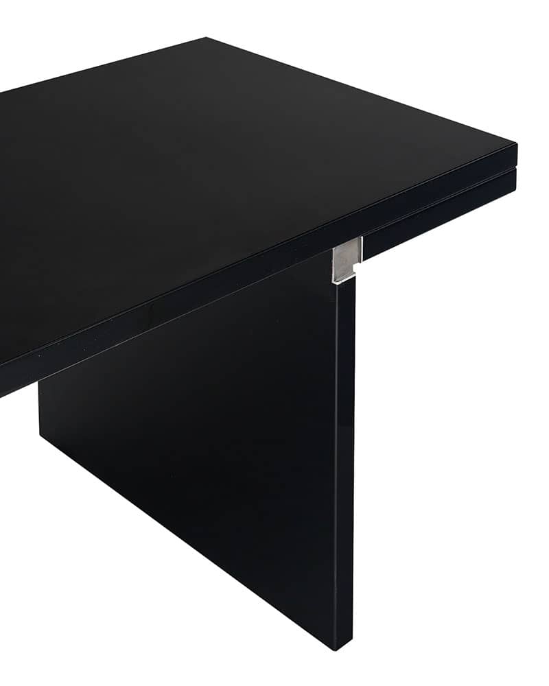 Italian lacquered table by Carlo Scarpa for Cassina. This piece is crafted with MDF panels that have been layered with very shiny mirror-like lacquer. The pieces are assembled using aluminum alloy joints. Carlo Scarpa’s designs are often notable for their strong angular lines and unique approach to material. 