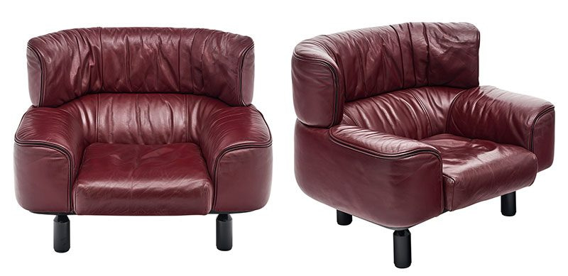 Pair of armchairs designed by Gianfranco Frattini for Cassina. This pair is made with red leather and has the Cassina signature on the backside of the seat pillows. We love the comfort, size, and style of this pair. High-end designer vintage furniture.