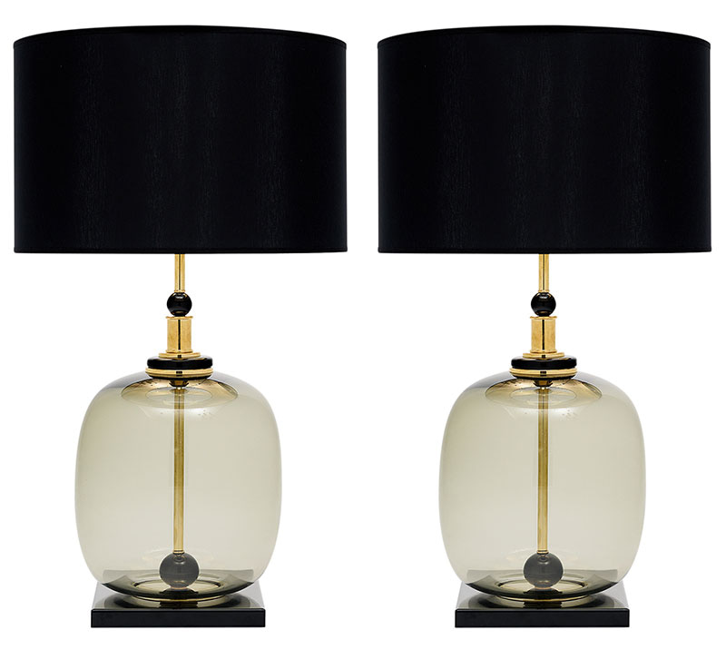 Pair of hand-blown Murano glass lamps featuring unique glass components on a brass structure. In the style of iconic Italian designer Ettore Sotsass. We love the geometric forms and strong impact this pair brings to a space. We love the contrast of the lightness of the glass with the strong brass details. This one-of-a-kind pair has been newly wired to fit US standards.