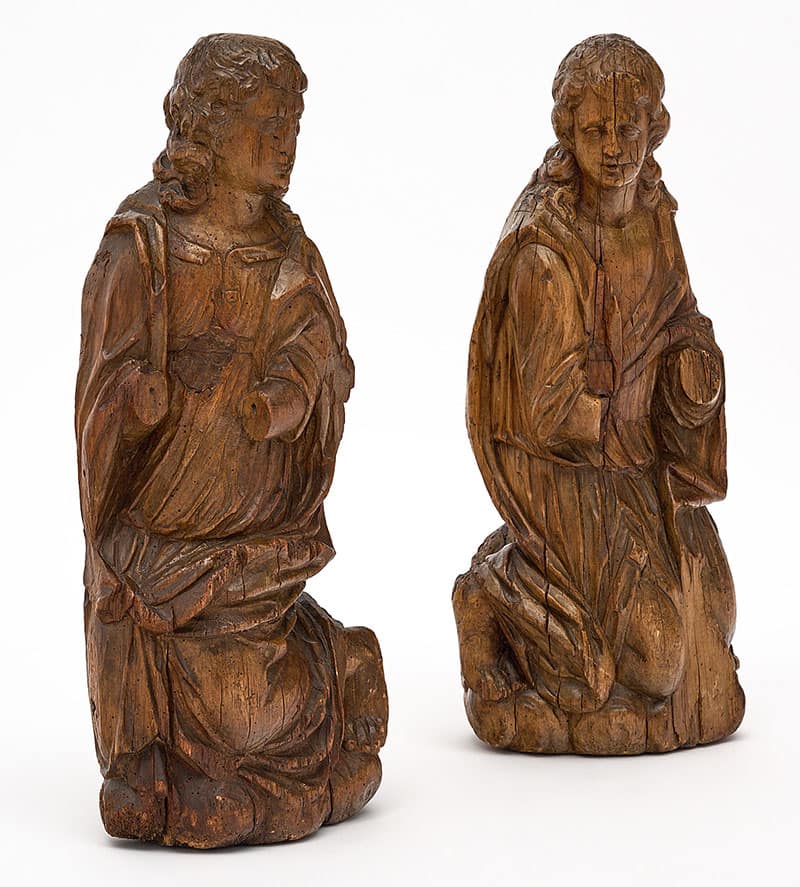 Pair of French church sculptures made of solid oak. These two antique figures are from a church in a private village in Luceram, in the south of France.