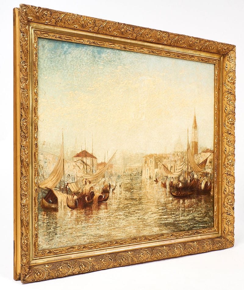 Beautifully presented in a 23 karat gold-leafed frame, this wonderful Turner like oil painting shows a daily 18th century scene of the grand canal in the city of Venice, with the Campanile in the background. The soft colors and warm gold tones are accented by the calm water and sky. The painting is not signed, but the strokes are very visual and artistic, adding tremendous texture to the image. This painting has been re-canvased. The 23 karat gold leafed frame is carved with floral and scroll details. This classic piece is a bold and great addition to any living space!